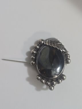Oval Brooch with Silver Leaf Accents